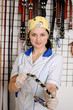 Woman veterinarian chooses collar and leash for your dog