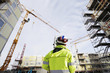 geodetist measuring inside lkarge construction site