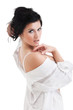 Portrait of the sexual woman in a man's shirt, on white