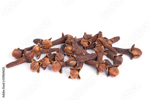 Photo: Pile Clove (Syzygium aromaticum) isolated on white background. Pile Clove (Syzygium aromaticum) isolated on white background.