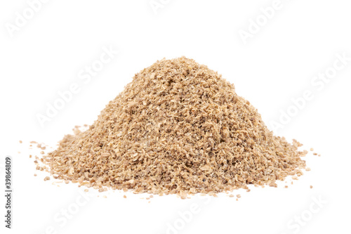 Photo: Heap ground Coriander (Coriandrum sativum) isolated on white bac Heap ground Coriander (Coriandrum sativum) isolated on white bac