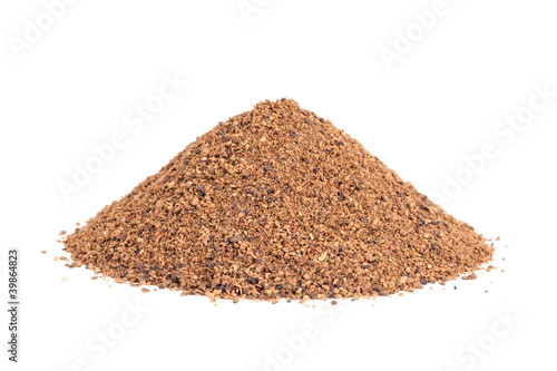 Photo: Pile of Nutmeg powder (Myristica fragrans) isolated on white Pile of Nutmeg powder (Myristica fragrans) isolated on white