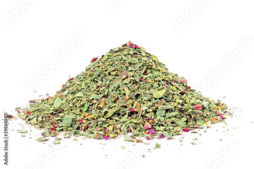 Photo: Pile of ground dried Basil (Sweet Basil) isolated on white Pile of ground dried Basil (Sweet Basil) isolated on white