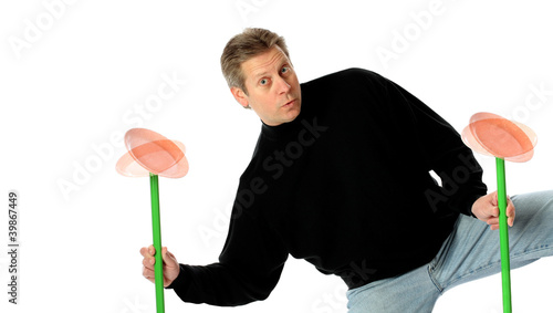 Photo: Multitasking by a Man Juggling Spinning Plates Multitasking by a Man Juggling Spinning Plates