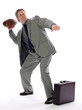 Photo: Business Man Throws a Football Business Man Throws a Football