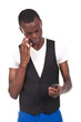 man holding a phone and looking worried
