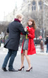 Happy couple dancing near Notre Dame de Paris