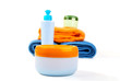 Terry towels and tubes with cosmetics isolated on a white Terry towels and tubes with cosmetics isolated on a white