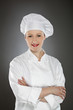 Confident young female chef