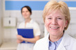 Photo: Portrait einer älteren Zahnärztin Portrait einer älteren Zahnärztin