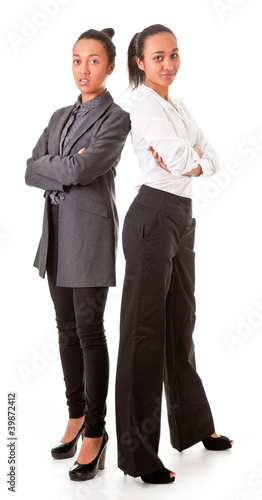 Photo: two business women in casual poses two business women in casual poses