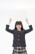ホワイトボードを持つ黒髪の女子生徒