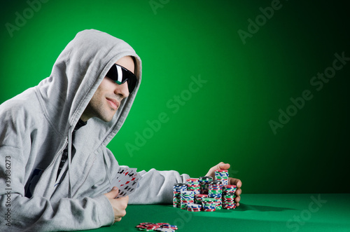 Photo: Man playing in the casino Man playing in the casino
