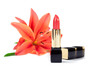 New lipstick and lily flowers, isolated on white background New lipstick and lily flowers, isolated on white background