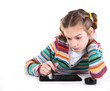 Photo: little girl drawing on the tablet little girl drawing on the tablet