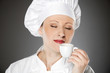 Yonug female chef drinking coffee