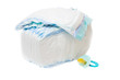 The pile of diapers and baby's dummy