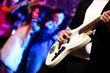 Young guitar player performing in night club Young guitar player performing in night club