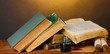 old books, scrolls, ink pen and inkwell