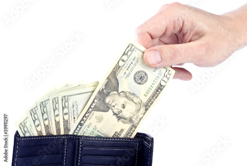 Photo: Man Pulling US Dollars from a Wallet Man Pulling US Dollars from a Wallet