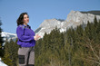Portrait of a young woman at winter in the mountains