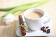 Tasse Kaffee mit Gebäck