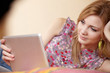woman holding a touchpad pc