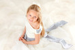 girl in communion dress smiling