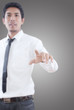 Businessman pushing on the whiteboard.
