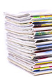 Foto: Stack of magazines isolated Stack of magazines isolated