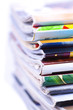 Foto: Stack of magazines isolated, close up Stack of magazines isolated, close up