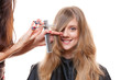 Foto: Studio shot of smiley woman and hairdresser Studio shot of smiley woman and hairdresser
