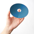 hand holding blu-ray disk