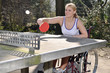 Rollstuhlfahrerin beim Sport