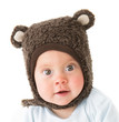 little boy in a cap with ear flaps