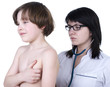 Photo: Young boy examined by woman doctor Young boy examined by woman doctor