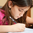 Hispanic girl working on her homework