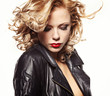 Portrait of a beautiful sexy woman in black leather jacket