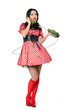 Young sexy pin-up woman in a polka dot with old telephone