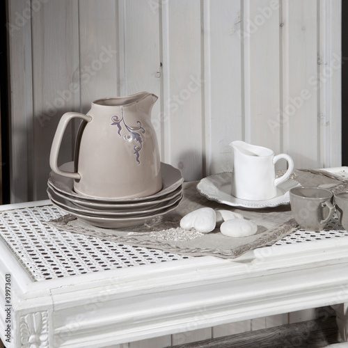 Photo: beige kettle and white milk jug beige kettle and white milk jug
