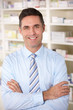 Portrait UK pharmacist at work