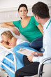 UK Accident and Emergency doctor with mother and child
