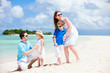 Happy family on tropical vacation