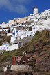 Oia village with its ancient monastery and its lovely windmill