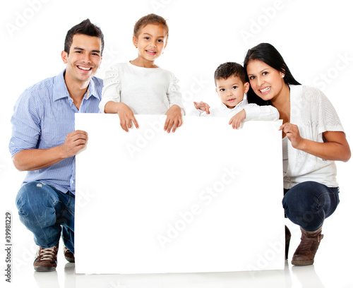 Photo: Family holding a banner Family holding a banner