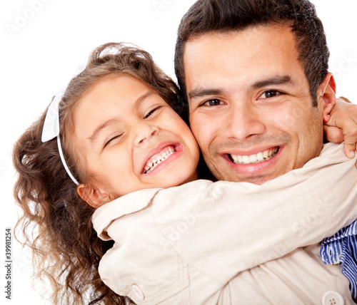 Photo: Girl hugging her father Girl hugging her father