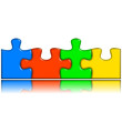 4 puzzle pieces combined with reflection