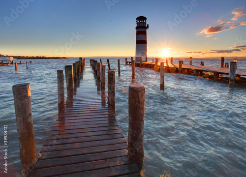 Photo: Lighthouse at Lake Neusiedl at sunset Lighthouse at Lake Neusiedl at sunset