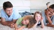 Family lying on front