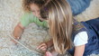 Close-up of children using a tablet computer